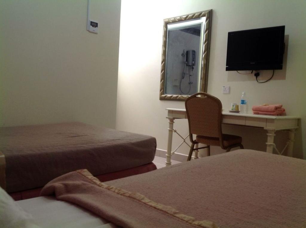 Hotel Morning Glory Kudat Pokoj fotografie